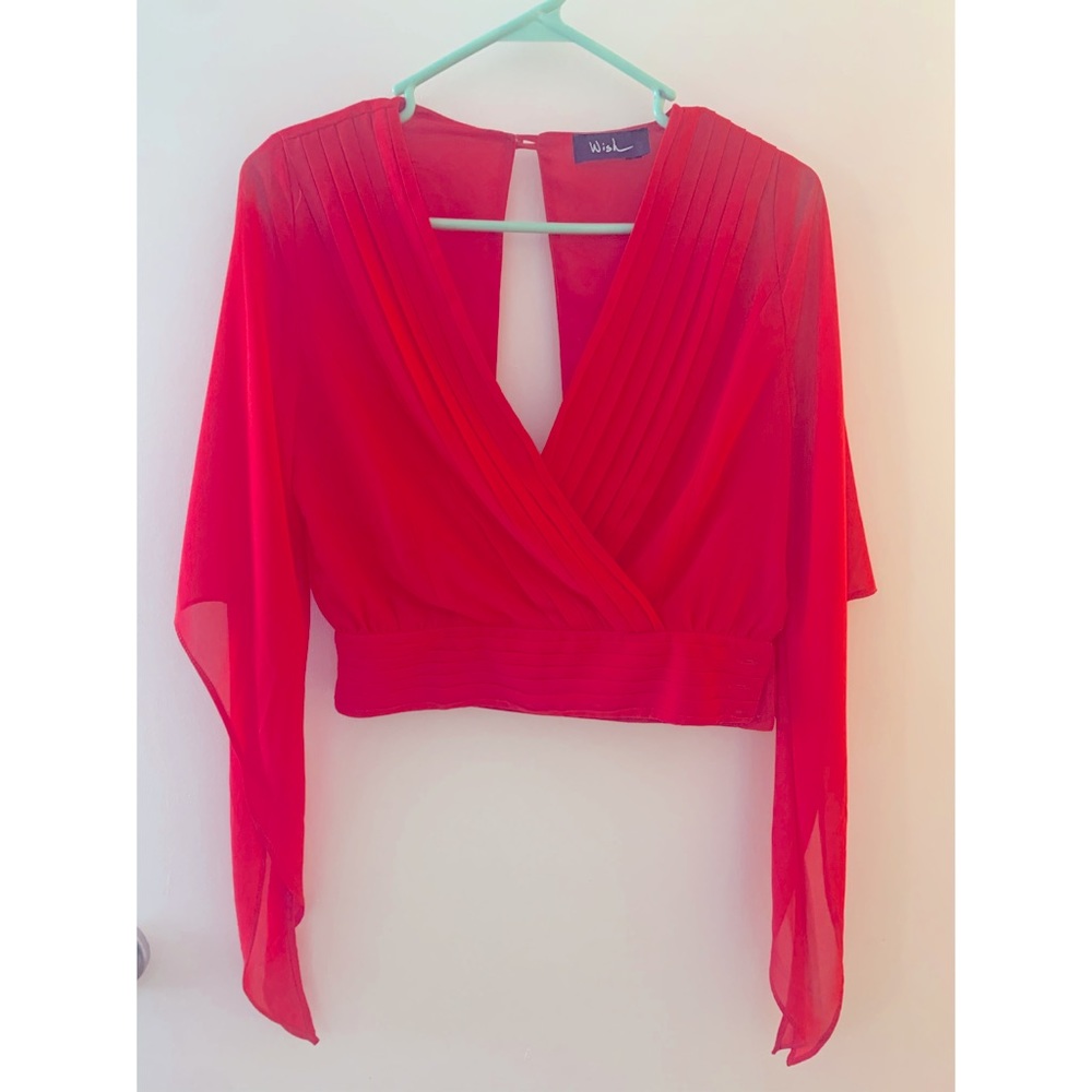 Low draped crop v neck blouse
